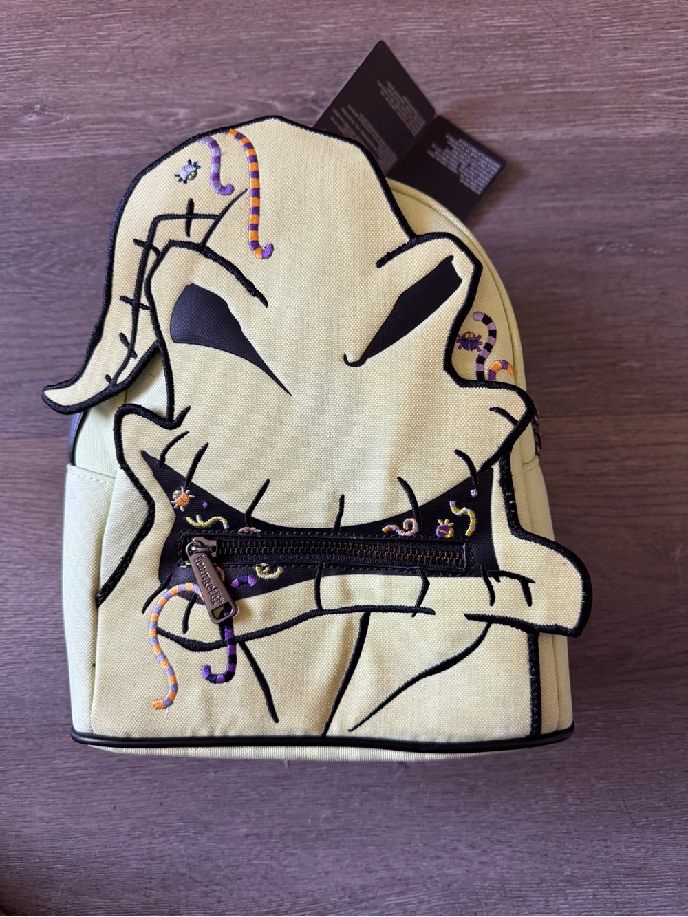 Loungefly Oogie Boogie Mini Backpack in Yellow with Purple & Orange Accents
